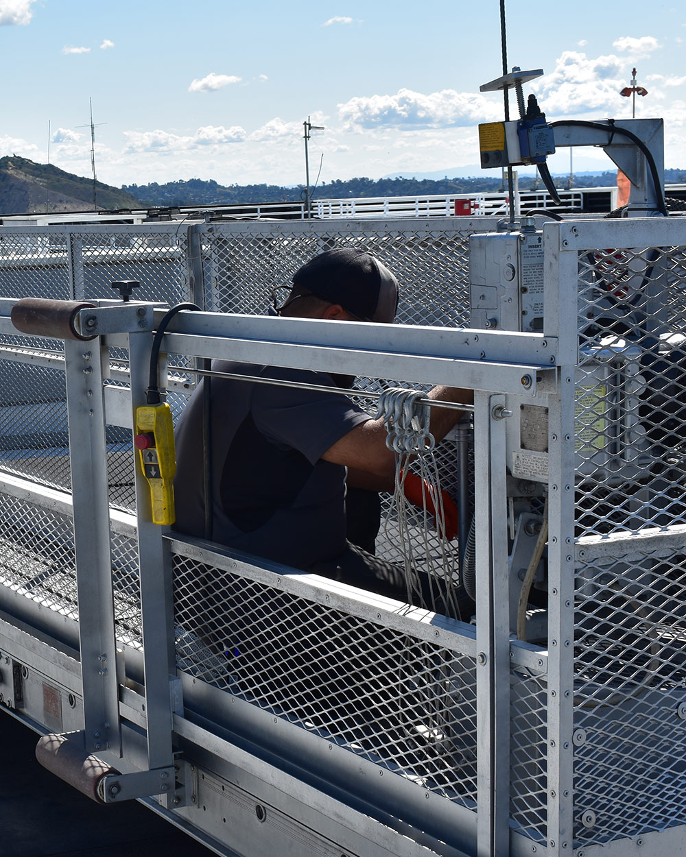 Image of Man Performing Swing Stage Inspection